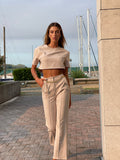 Completo maglia crop e pantalone beige - R.a. Boutique 