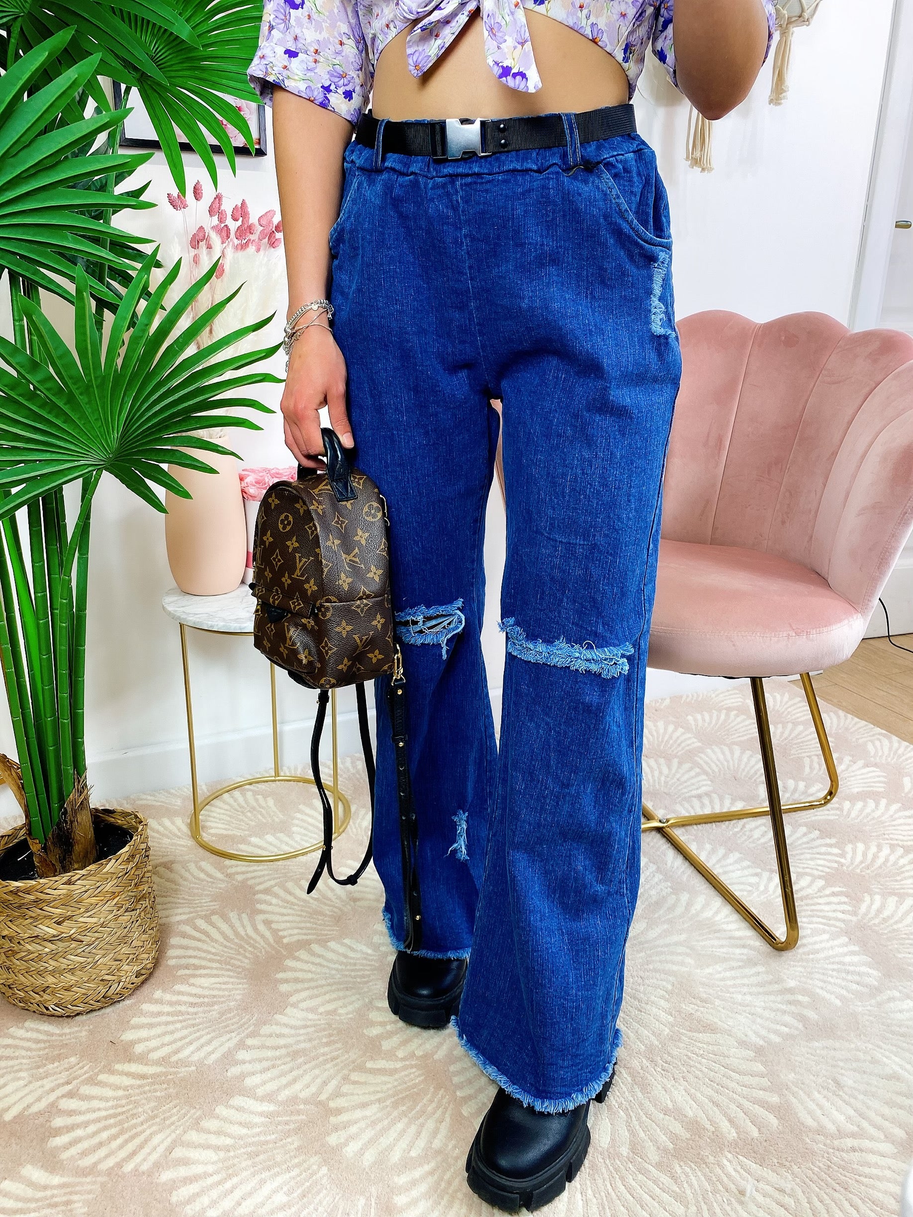 Jeans con cintura e strappi zampa larga - R.a. Boutique 