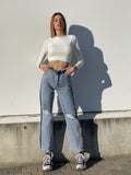 Jeans wide leg con strappi e dettaglio - R.a. Boutique 