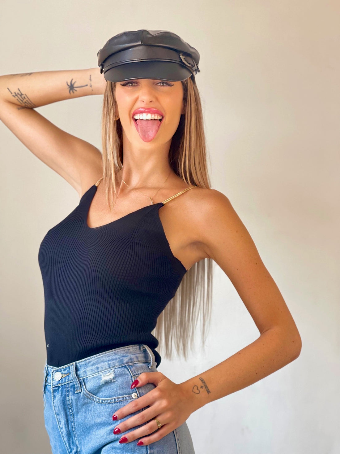 Top a costine nero spalline oro - R.a. Boutique 