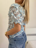 Camicia celeste a manica corta con fiori - R.a. Boutique 