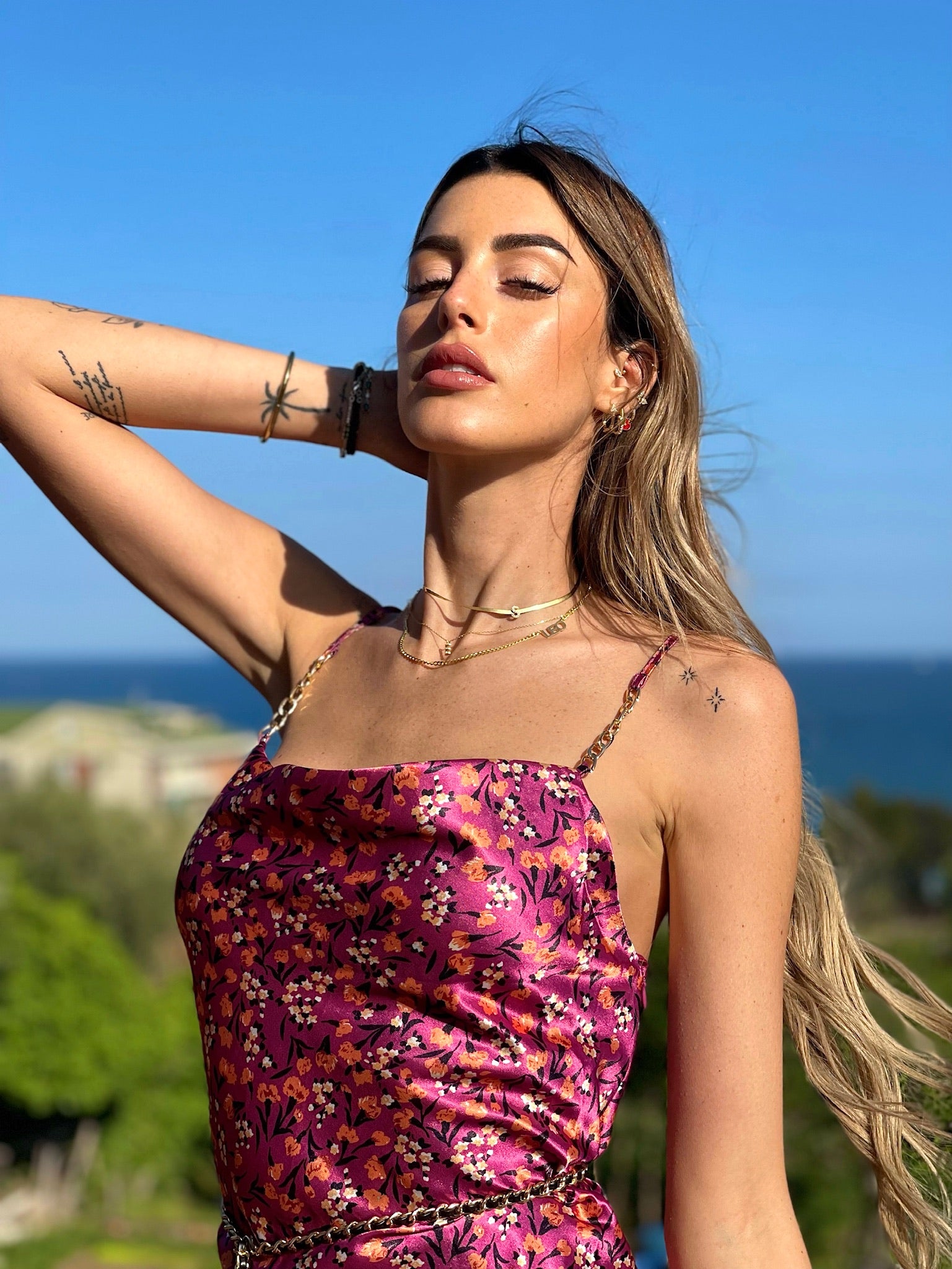 Abito a fiori fuxia - R.a. Boutique 