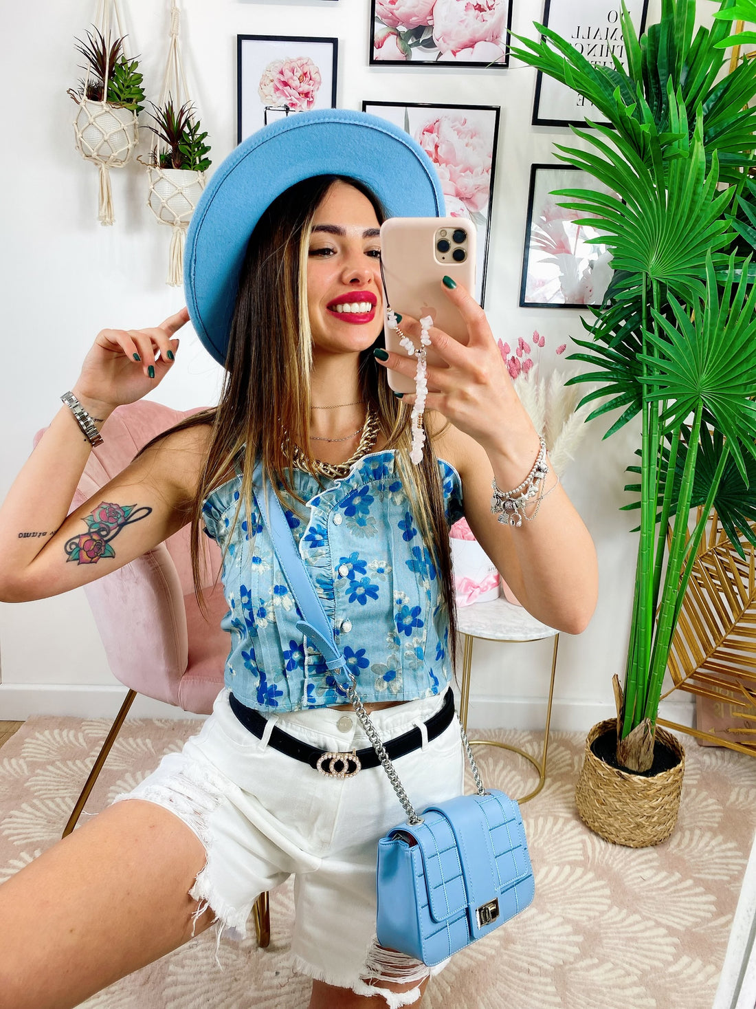 Top celeste con fiorellini - R.a. Boutique 