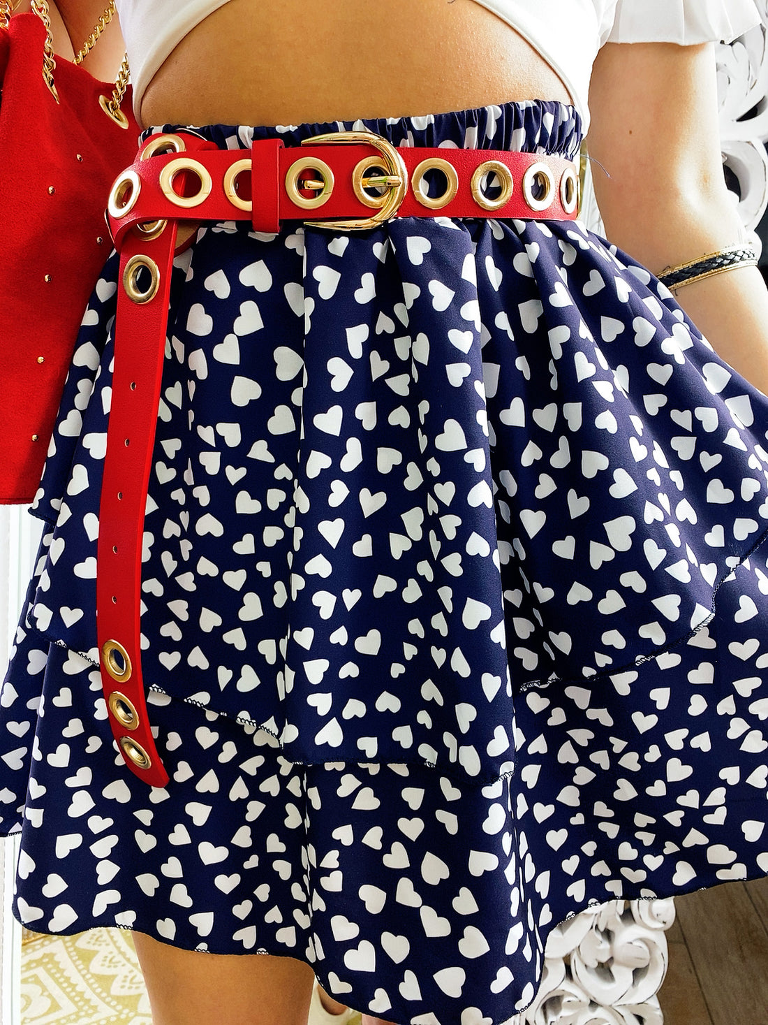 Cinturino con occhielli rosso - R.a. Boutique 