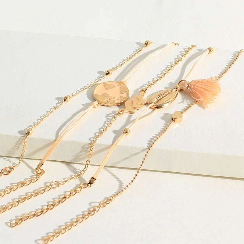 Bracciale con mondo e nappina rosa - R.a. Boutique 