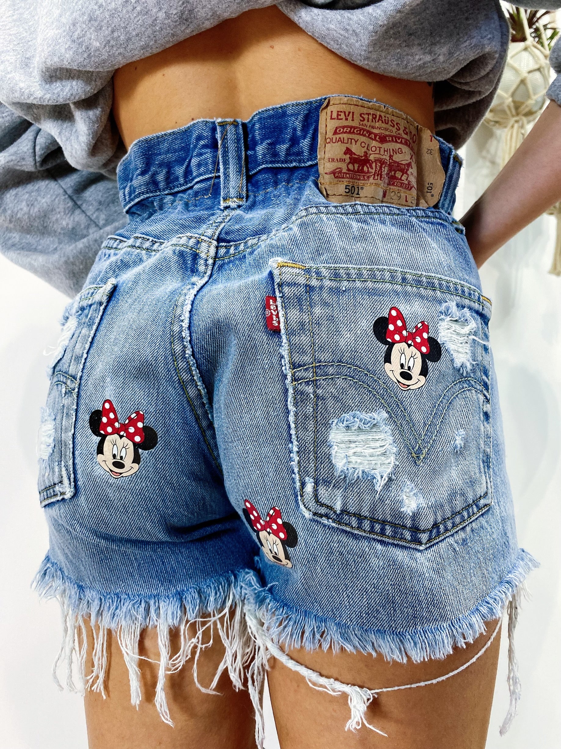 Levi’s Vintage stampa topolina e strappi bagno medio - R.a. Boutique 