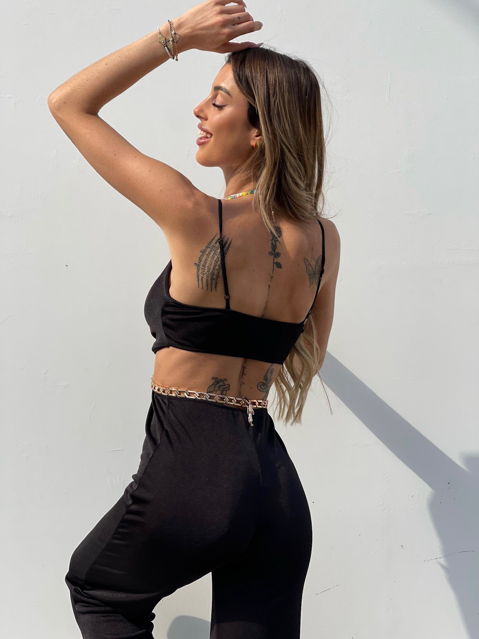 Tuta lunga nera con catena - R.a. Boutique 