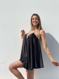 Abito in raso nero con punto luce - R.a. Boutique 