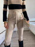 Leggins in eco-pelle con catene beige - R.a. Boutique 