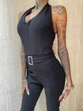 Tuta nera schiena aperta con cintura gioiello - R.a. Boutique 