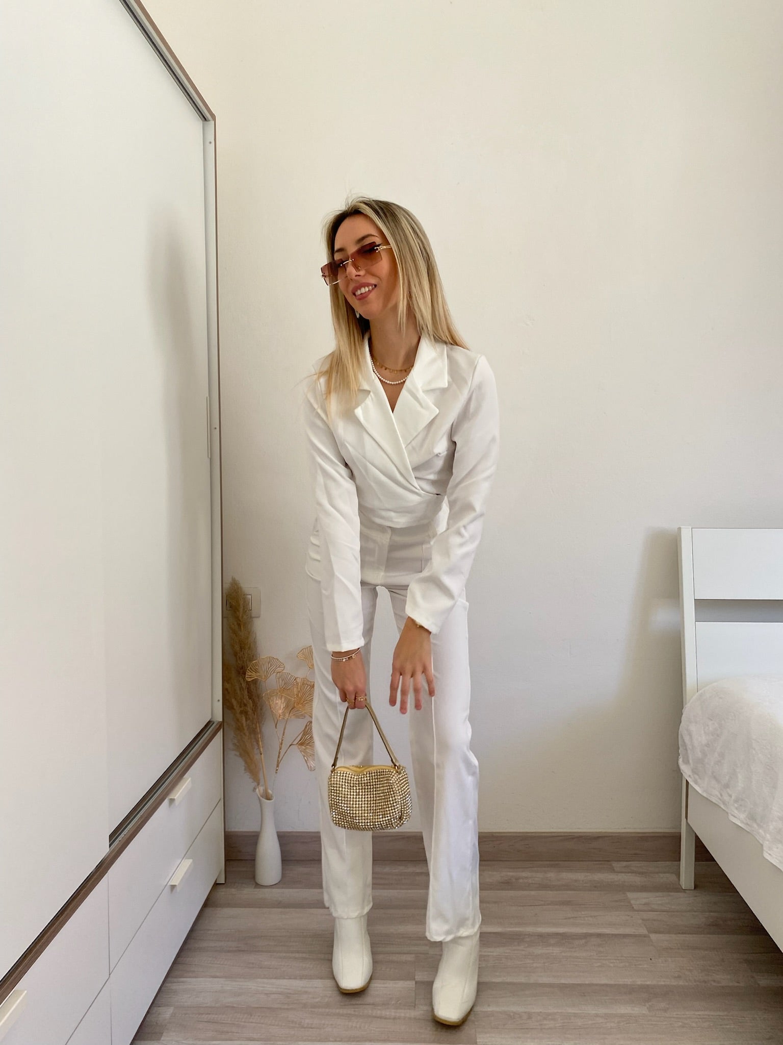 Completo top e pantalone bianco - R.a. Boutique 