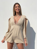Tutina beige con fiocchetti - R.a. Boutique 