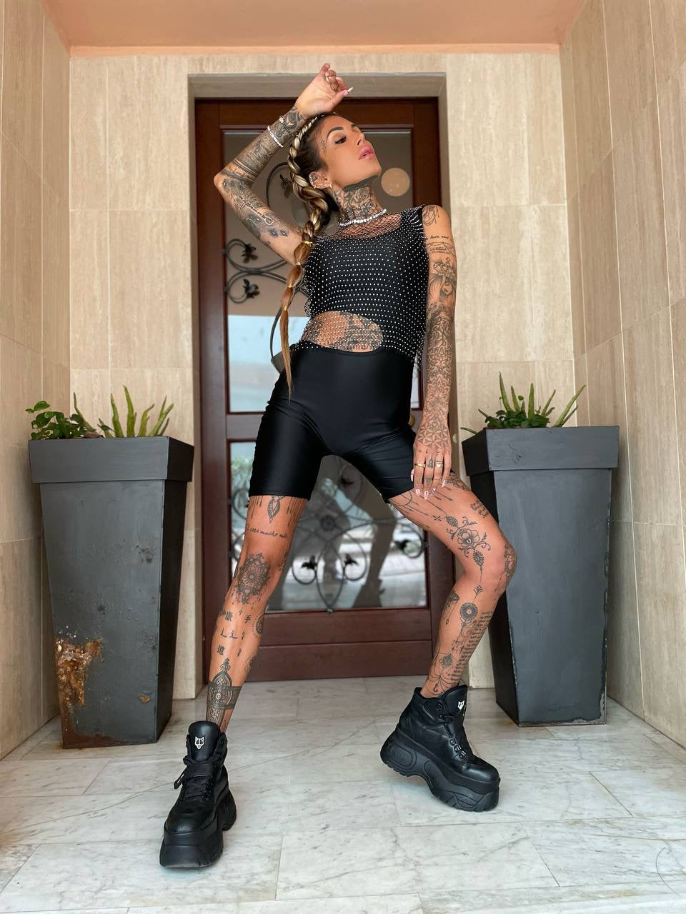 Tutina nera con oblò - R.a. Boutique 