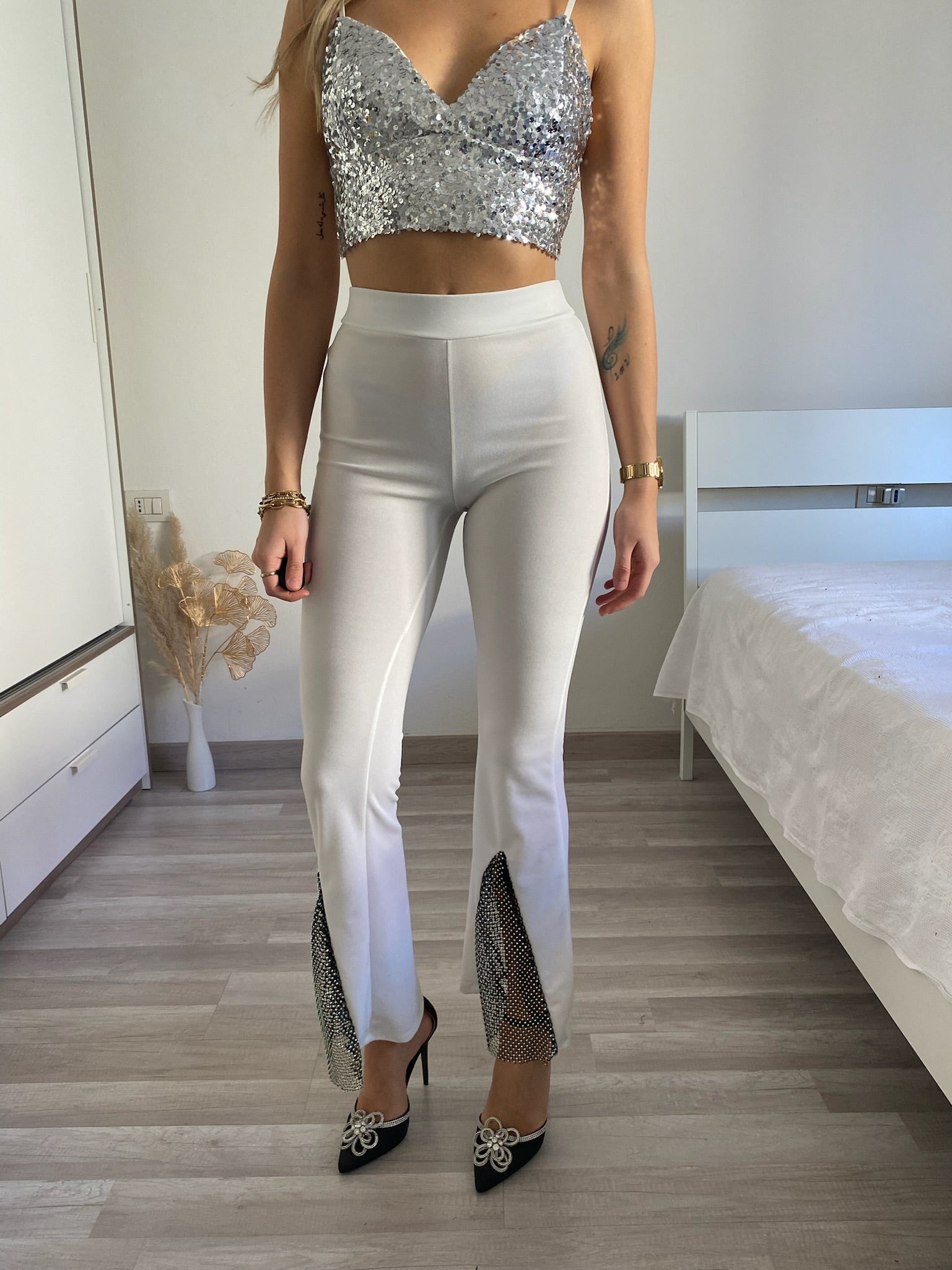 Pantaloni a zampa con strass bianco - R.a. Boutique 