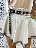 Short in ecopelle bianco con borchie - R.a. Boutique 