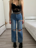 Jeans con strappi wide leg - R.a. Boutique 