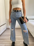 Jeans wide leg con strappi e dettaglio - R.a. Boutique 