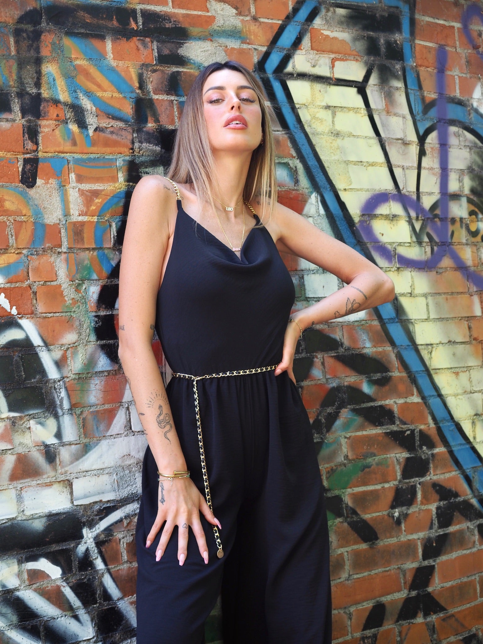 Tuta nera a palazzo spalline in catena - R.a. Boutique 