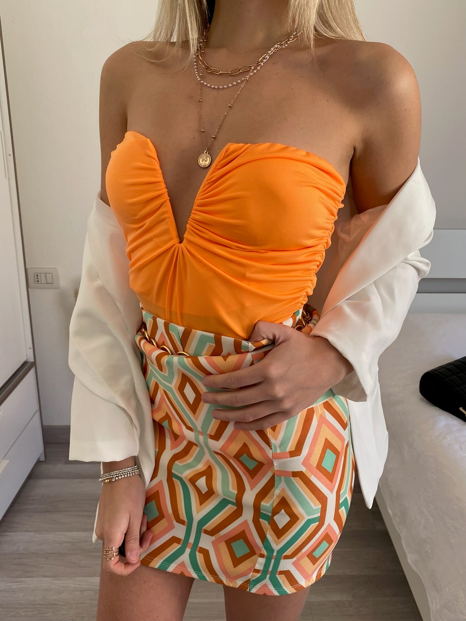 Top arancio con scollo a V - R.a. Boutique 