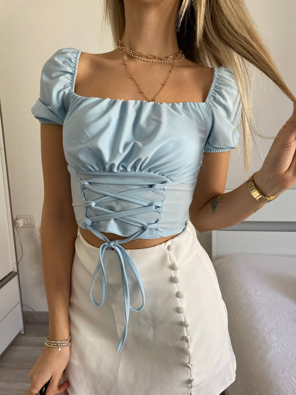 Top celeste manica corta con lacci - R.a. Boutique 