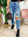 Jeans con strappi - R.a. Boutique 