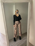 Pantalone a zampa animalier - R.a. Boutique 