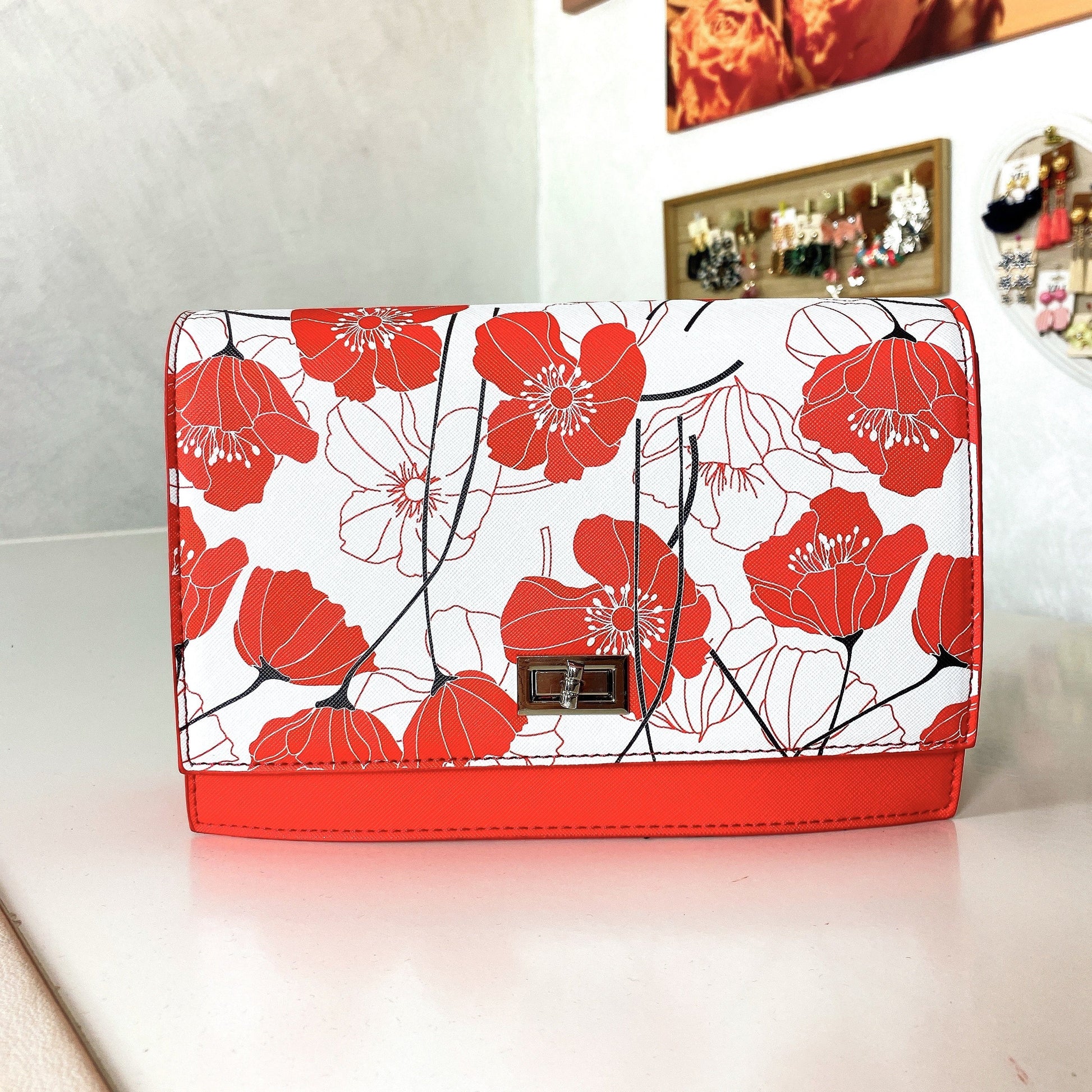 Pochette con fiori - R.a. Boutique 