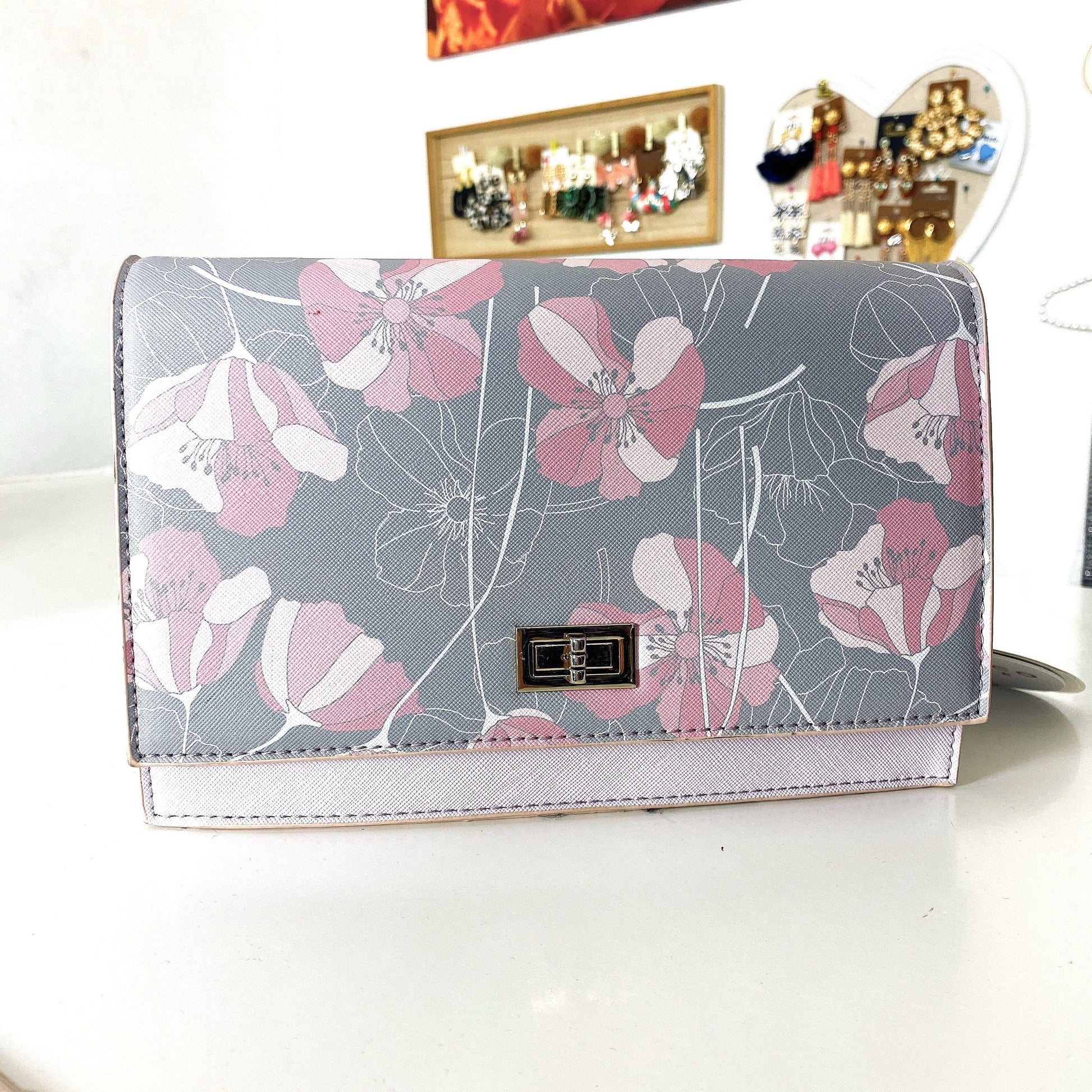 Pochette con fiori - R.a. Boutique 